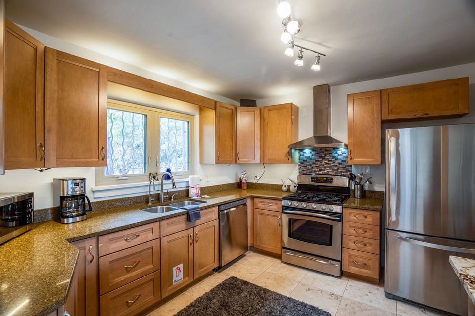 Gourmet kitchen with stainless steel appliances.