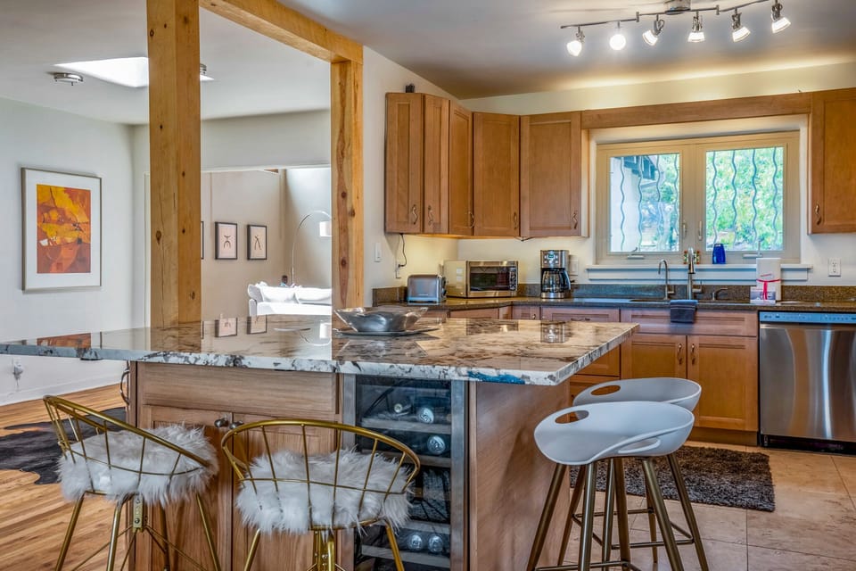 Spacious island invites to enjoy your favorite appetizers or coffee.