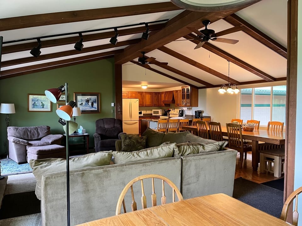 Open floor plan living room, dining room and kitchen.