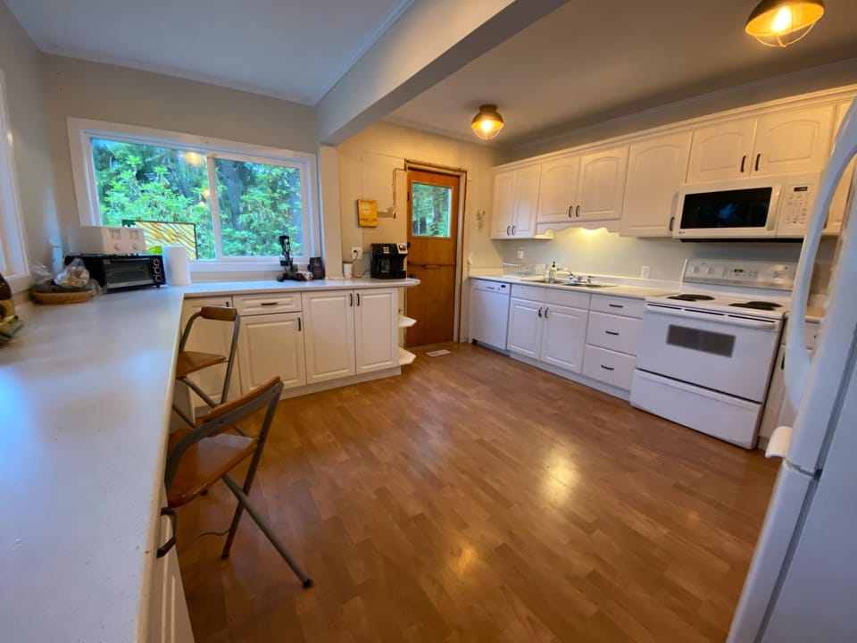 Expansive well equipped kitchen upstairs 