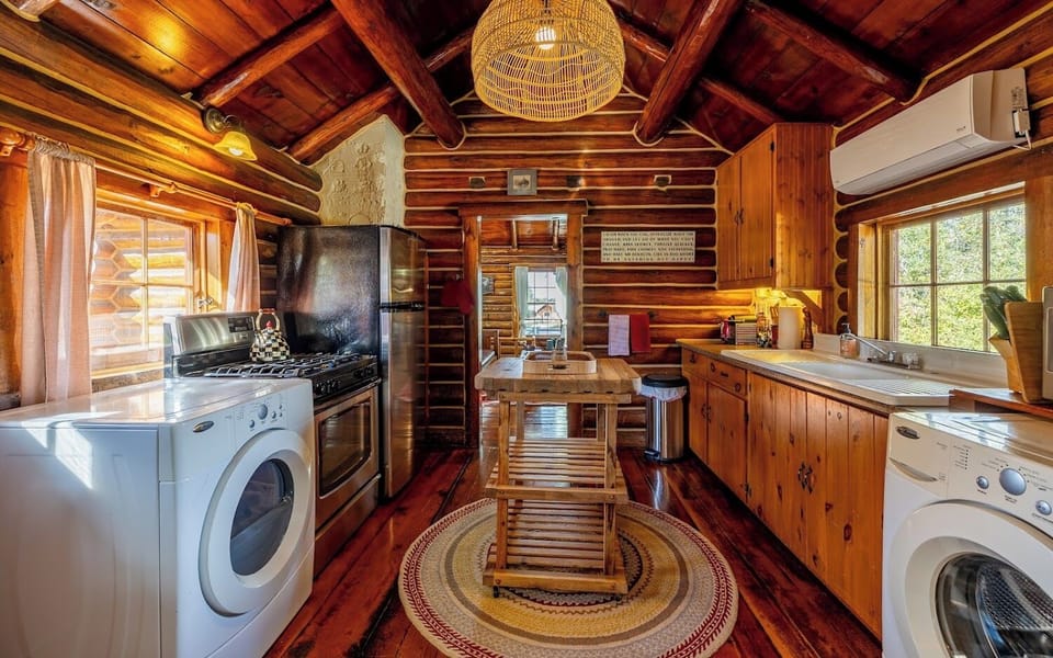 Modern appliances blend with charming finishes in the kichen.