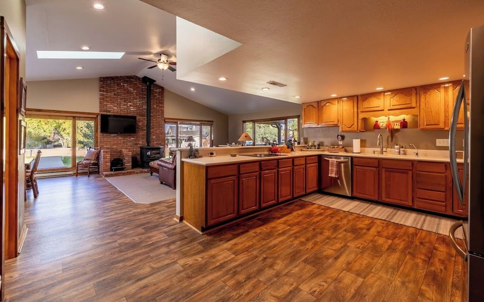 Gather round the large kitchen space with breakfast bar