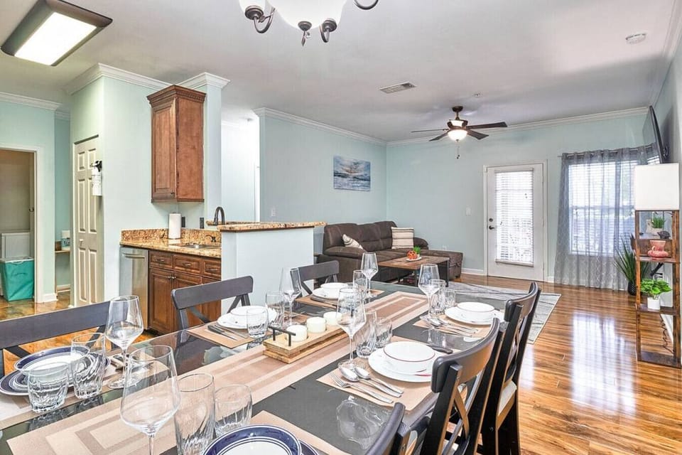 Enjoy delightful meals with family and friends at our wooden dining table for six.