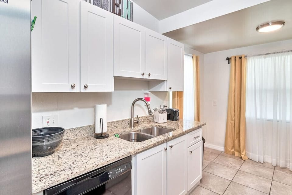The kitchen provides ample space and basic cooking utensils, plates, and glasses, allowing you to prepare simple meals or experiment with your culinary skills
