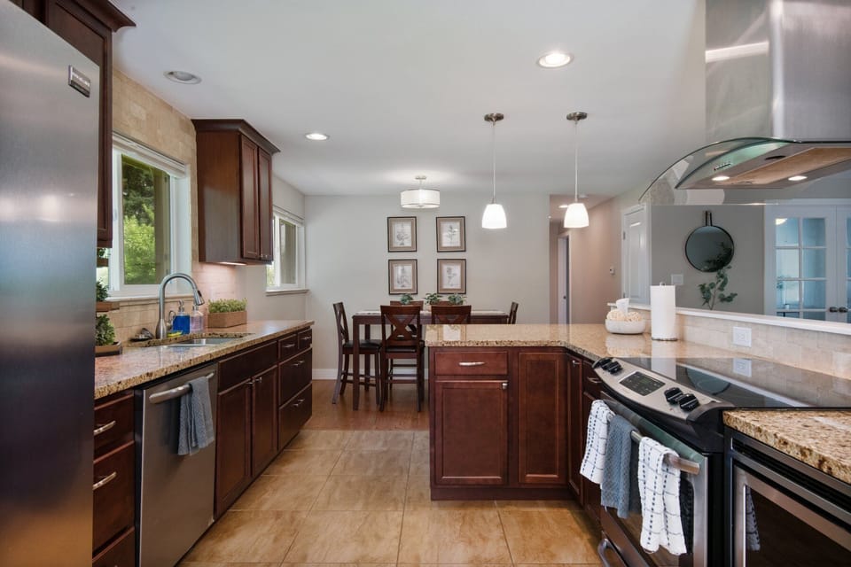 Gather around the kitchen and dining area for meals and good company.