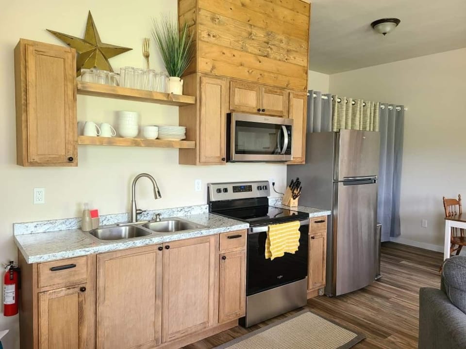 Creating meals and making memories! Our fully stocked kitchen has everything you need for home-cooked meals, including a stove, oven, microwave, full-size fridge, coffee pot, blender, and toaster. (Please note: no dishwasher.)