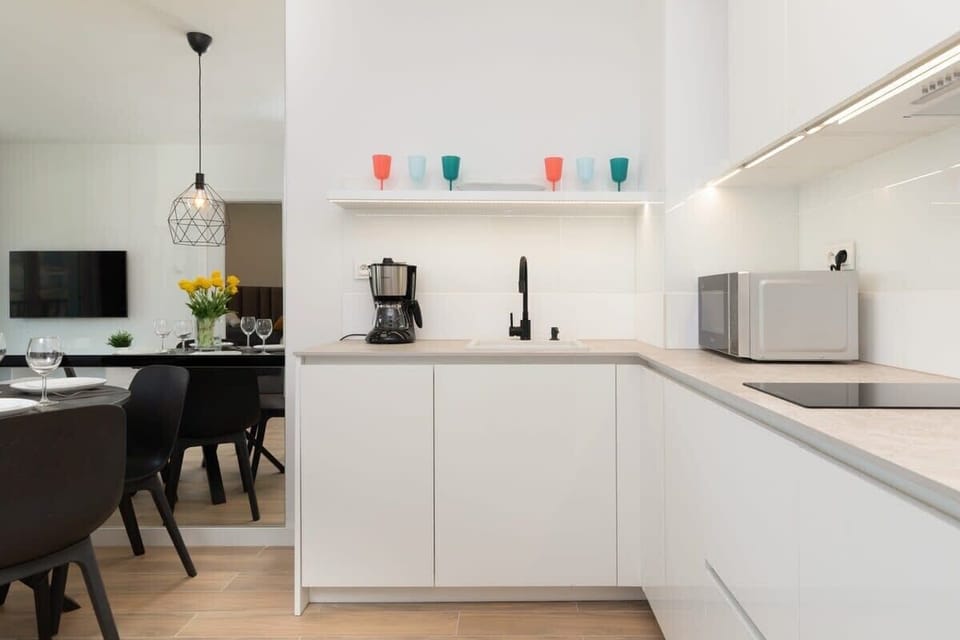 The fully equipped kitchenette includes everything you need for a home-cooked meal.