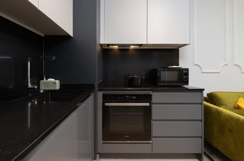 The fully equipped kitchenette includes everything you need for a home-cooked meal.