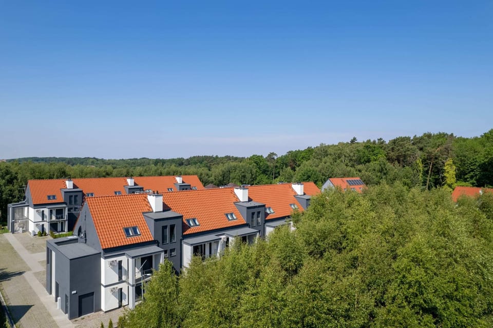 The building is close to charming beach.