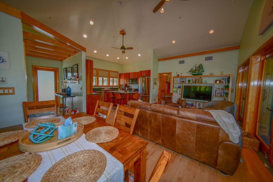 Dining area open to kitchen and living space for easy gathering