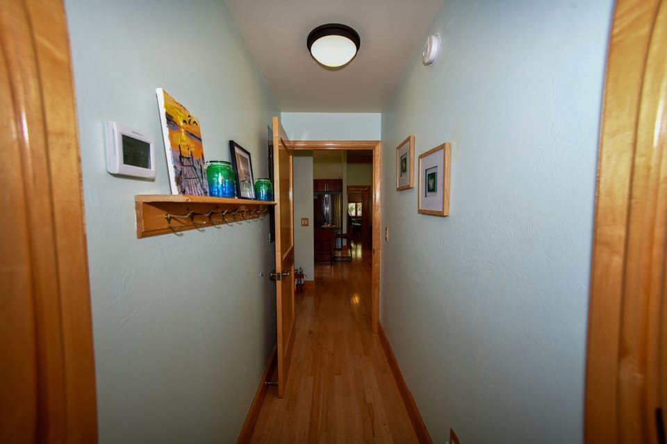Both bedrooms are tucked behind private hallways for privacy