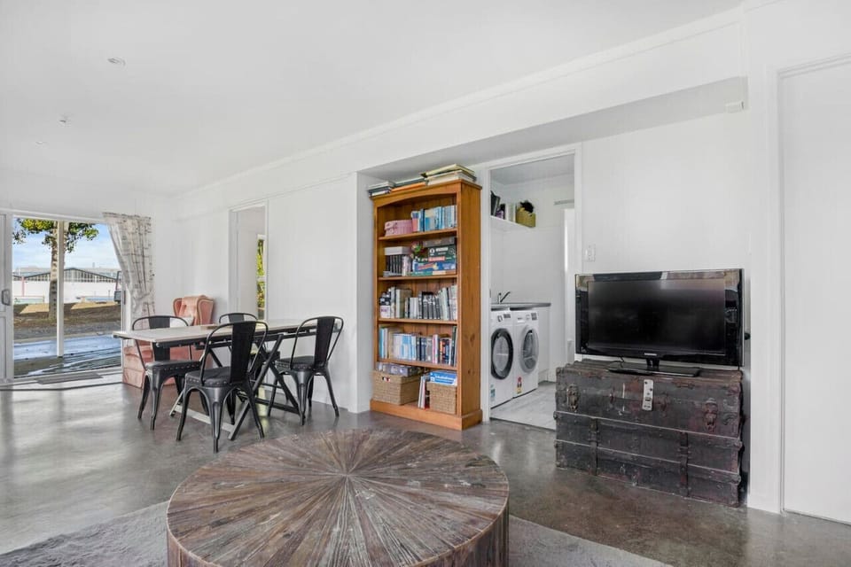 The bathroom and laundry is located off the main living spaces.