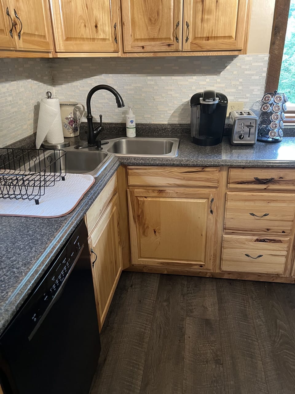 Kerig coffee pot and coffee pods provided along with creamer.