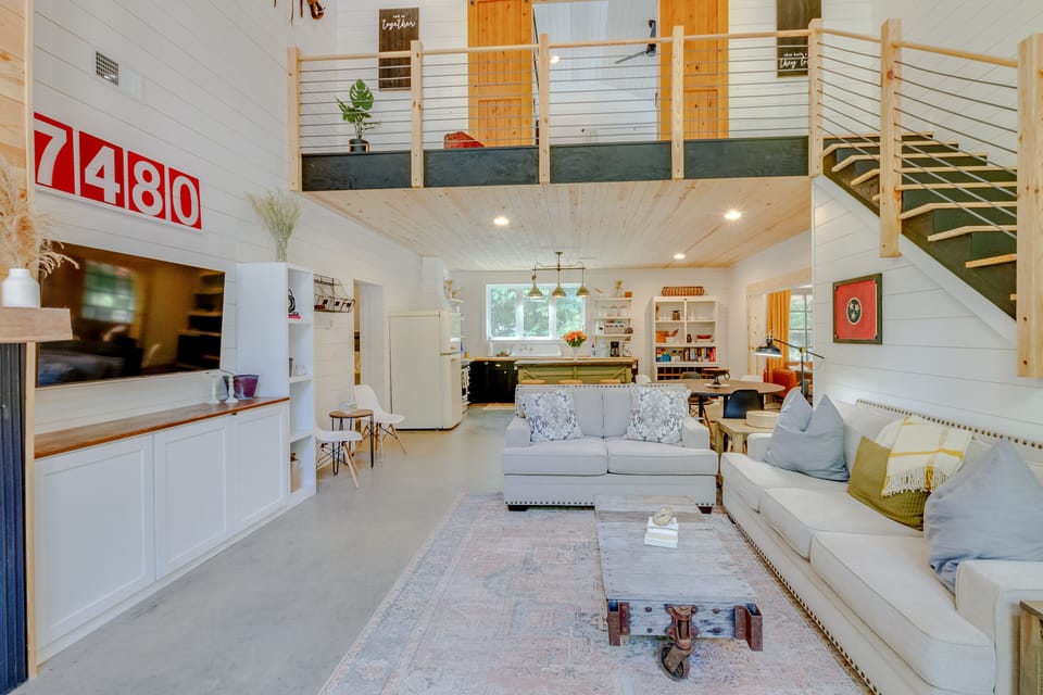 Open concept living, dining, kitchen and 24' ceilings.  Home is 2,160 square ft!