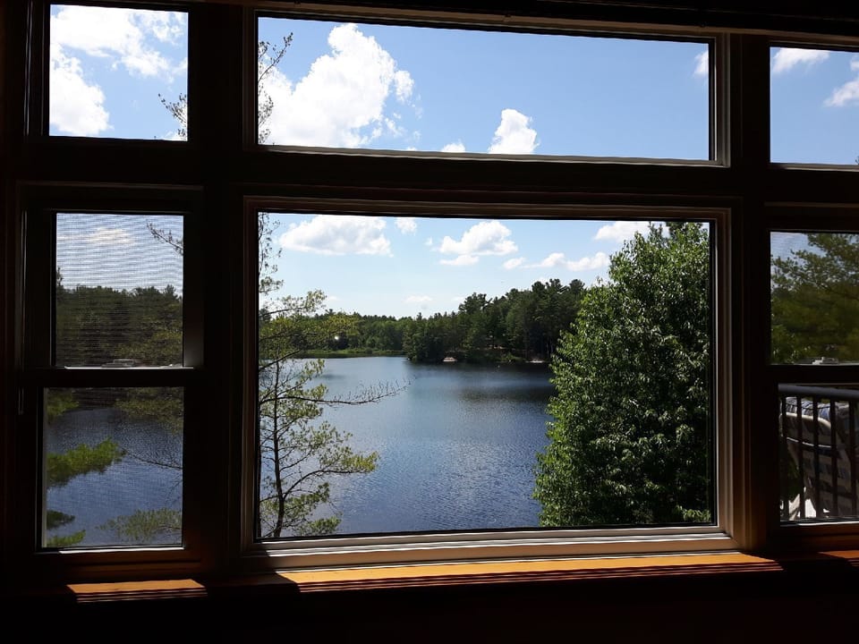 Lake views from every room, especially the huge picturesque living room windows!