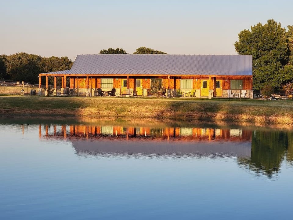 Large, shared porch facing the pond