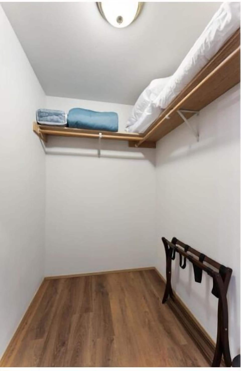 Walk in closet in the Master Bedroom - extra blankets and pillows