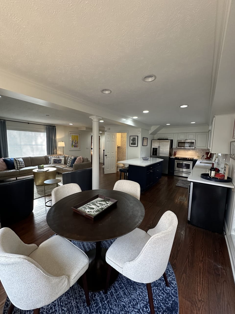 View from dining to living/kitchen/entry. 