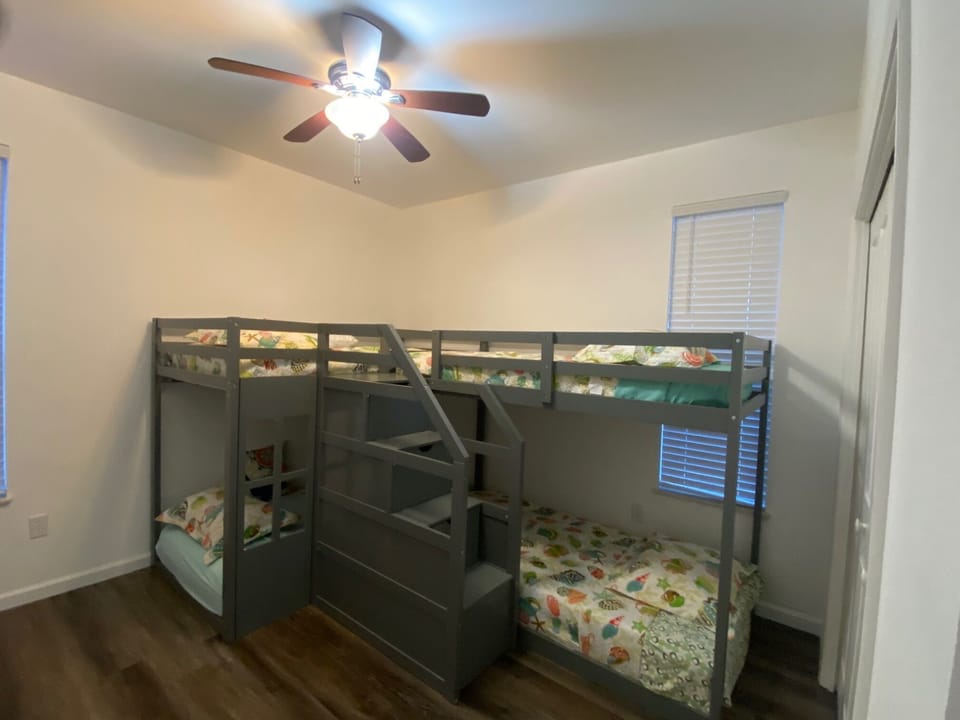 Quad bunk bed - room with Smart TV, dresser and full closet - 