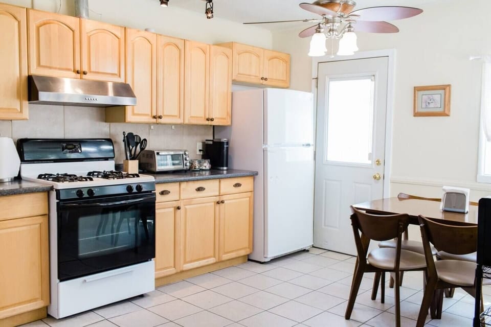Kitchen + Dining Area. Door leads to the back patio