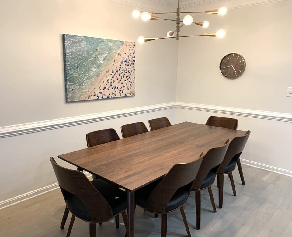 Walnut dining table with seating for 8 so the whole family can eat together.
