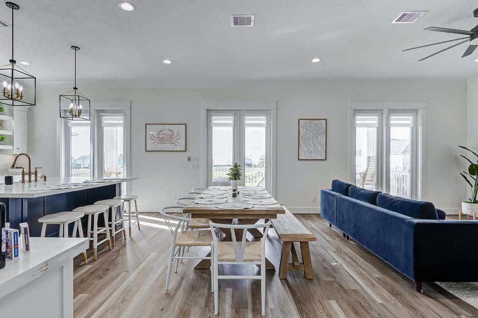 Open-concept living and dining areas with a 70" UHD 4K App-enabled Smart TV 