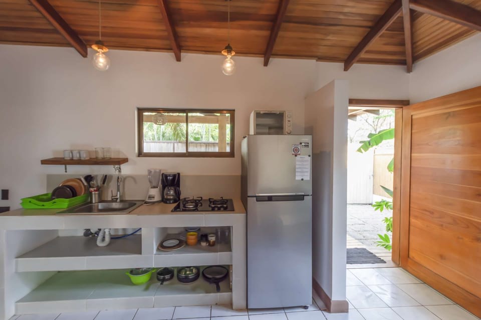The kitchen has ample storage space and all the basic necessities for any length of stay