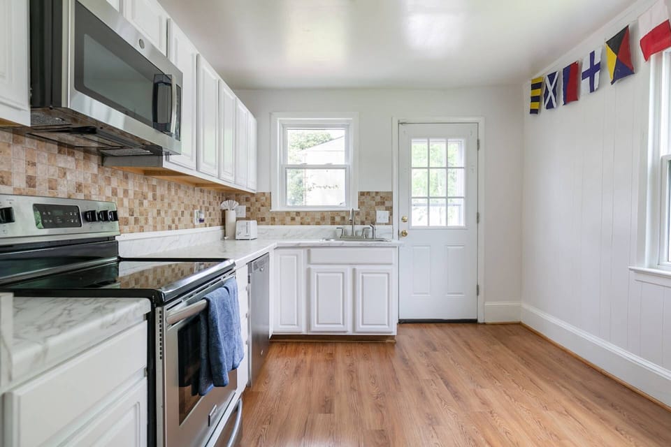 The newly-renovated kitchen is fully-stocked for your stay.