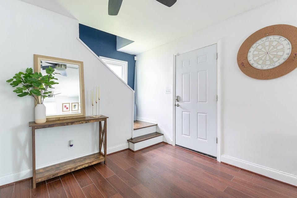 Back inside, head upstairs to the 2 bedrooms, Den and full bath.