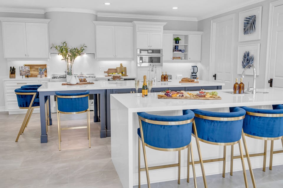 The kitchen is a chef's dream with plenty of space for cooking and preparation with plenty of seating space.