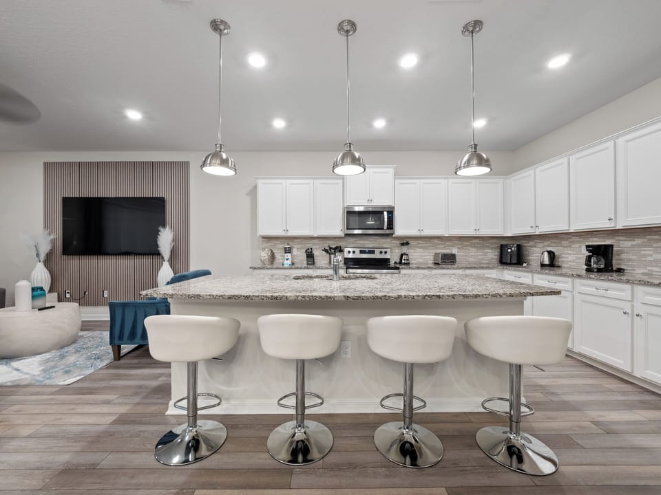 Modern Full Size Kitchen with Bar Stool Seating for 4