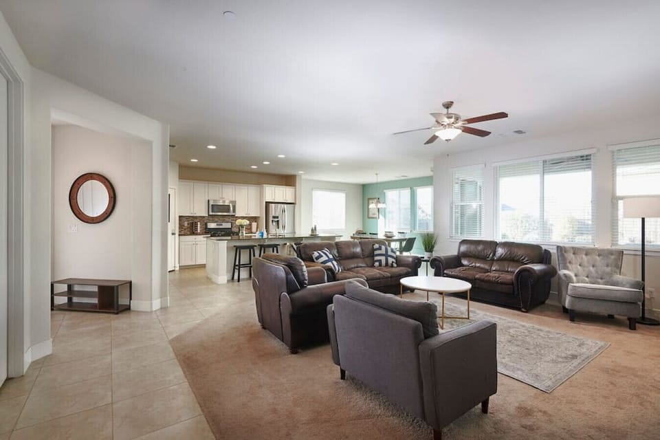 Cozy living room with 55" TV and Roku.