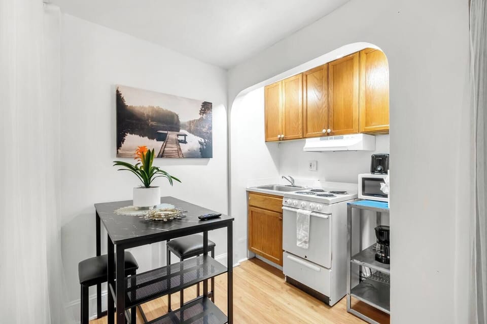 
Fully stocked kitchen with stove oven microwave coffee maker, toaster and all cookware flatware and silverware.