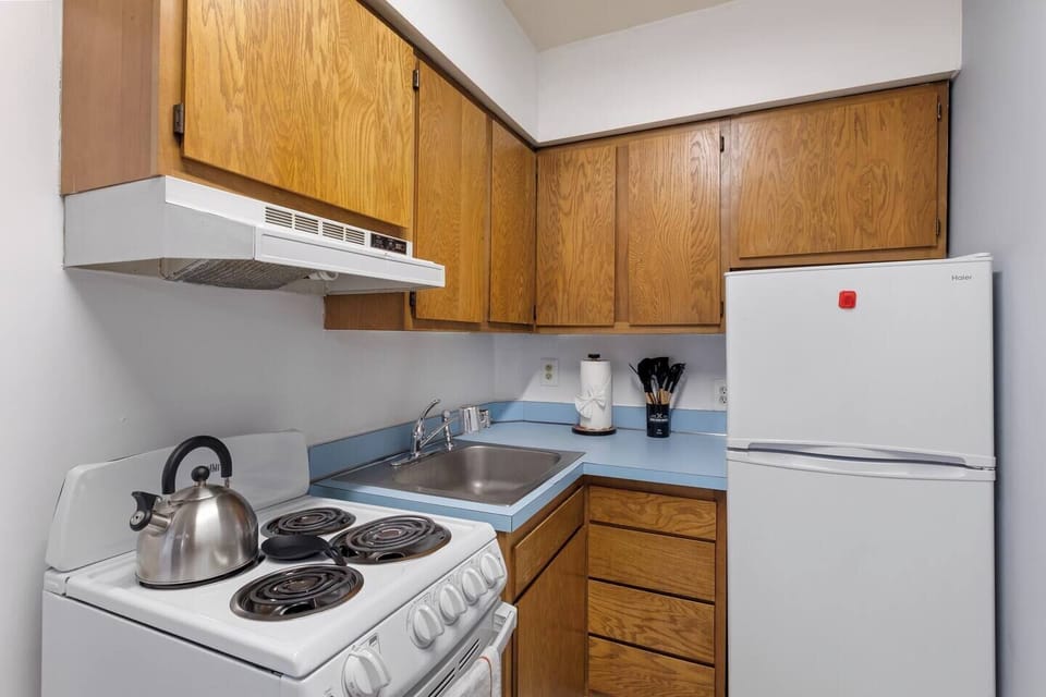 Fully equipped kitchen with modern appliances and ample counter space for all your cooking needs.