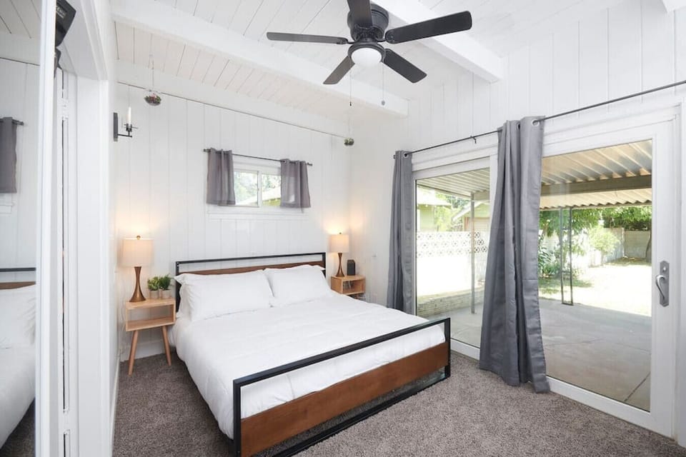 Bedroom 1- King Bed, and an outdoor view.