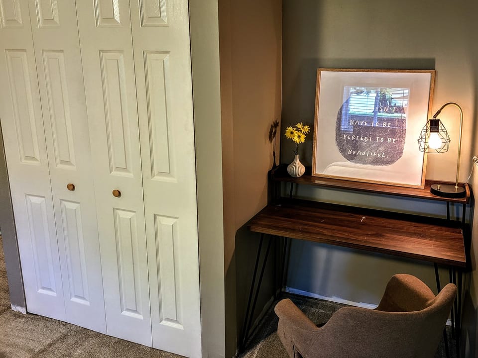 Sometimes fun travel gets to include a bit of work. In case your trip isn't all play, here's a quiet little workspace in the lower bedroom.