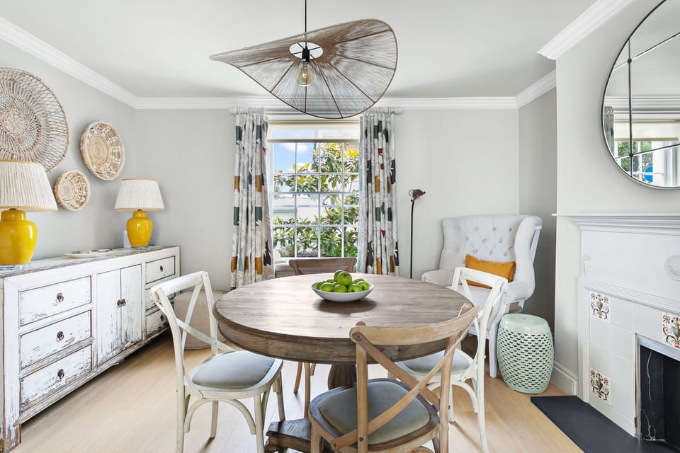 Open plan dining and kitchen space, Sonos speaker and armchair - Poplar Cottage