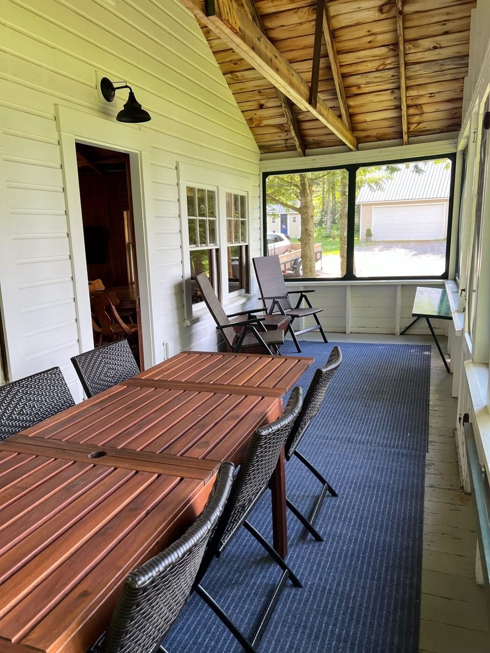 Front screened porch with dining table