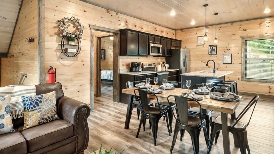 The best part about this home? The open concept living room, dining room and kitchen.aits you in this cabin with open concept living and kitchen space.