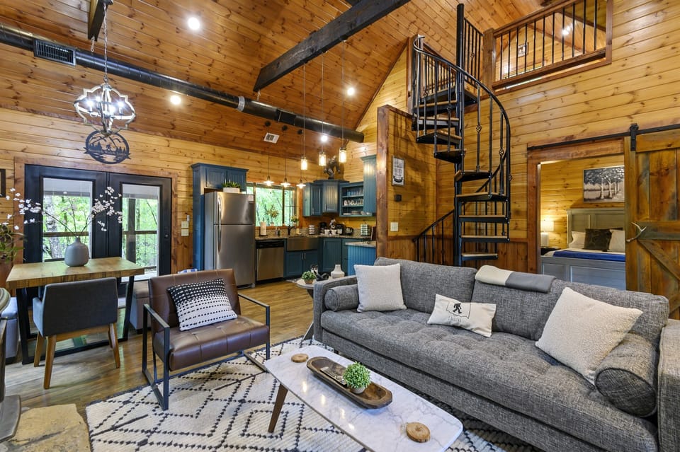 This Stylishly Updated Cabin Combines Timeless Warmth with Modern Functionality in One Flowing Space