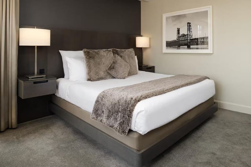 Sink into crisp linens and plush throws for deep rest.