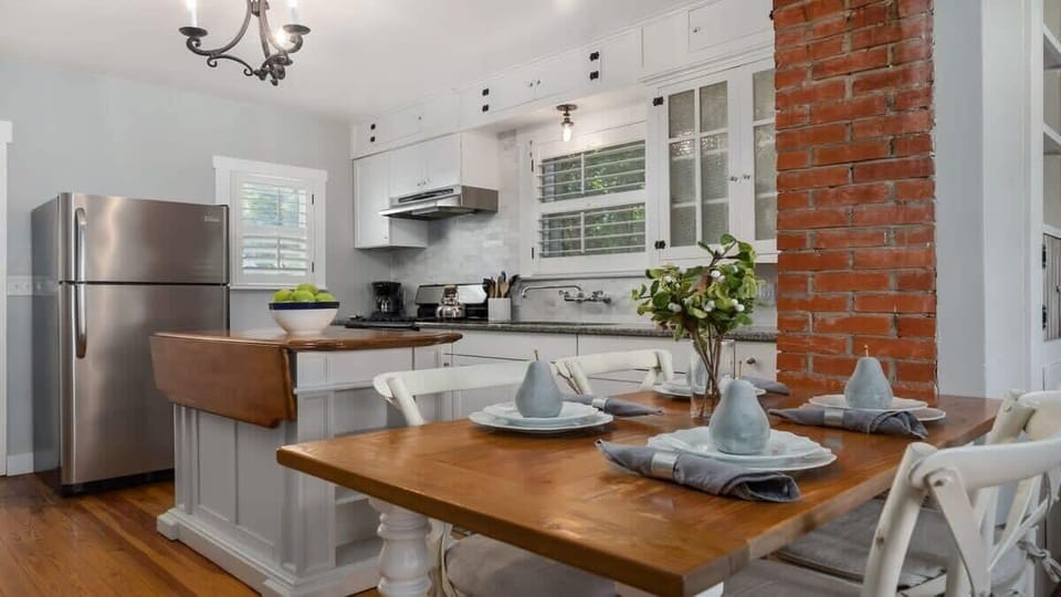 Beautiful kitchen + dining with great space.