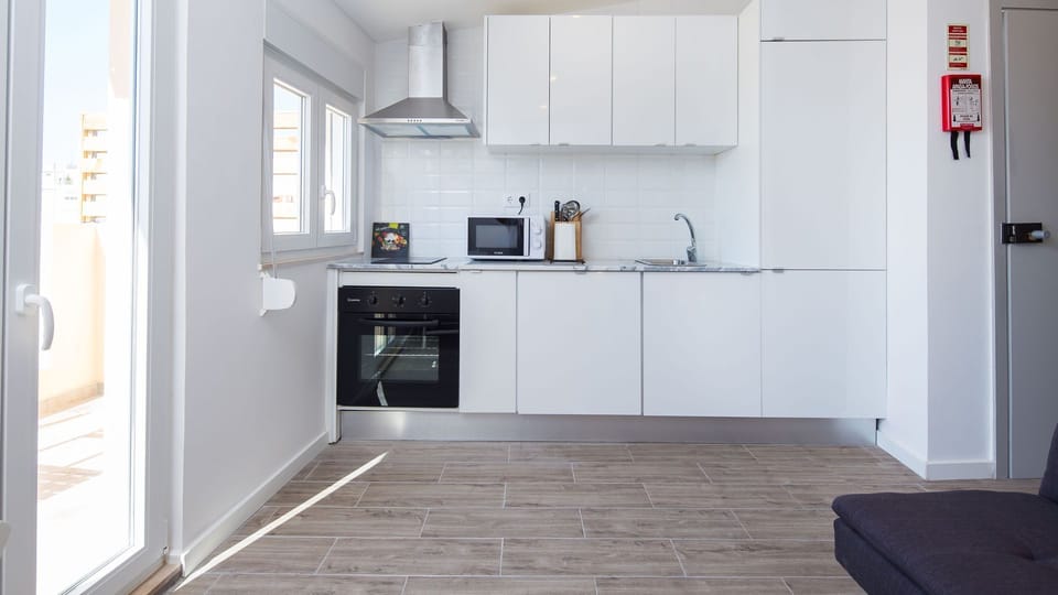The kitchenette has all the amenities you'll need for your meals #homecooking #clean #portugal #pt #lisbon
