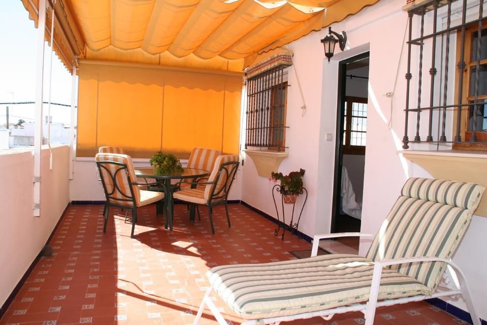 Extensive private terrace (30m2), very sunny (south facing) with awning and garden furniture.