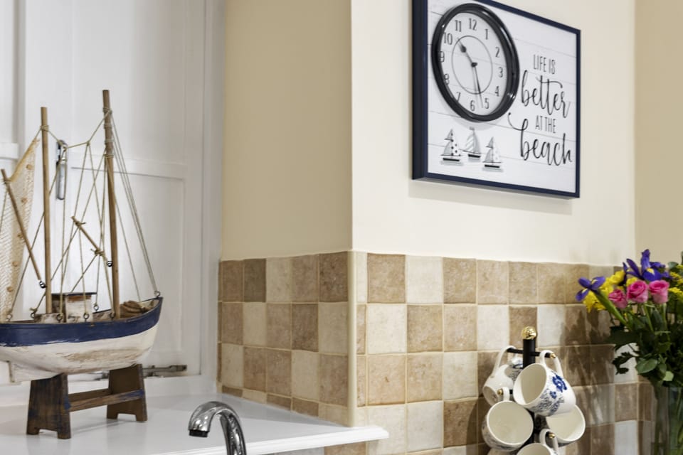 Nautical themed decor reflecting the seaside location of the property.