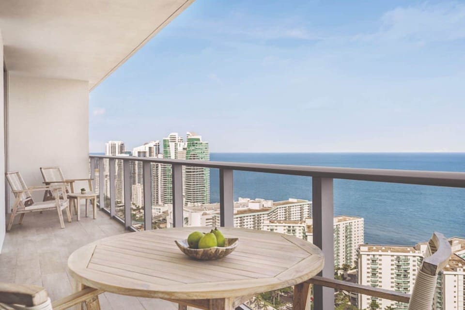 Sip morning coffee on the balcony with sweeping ocean views.