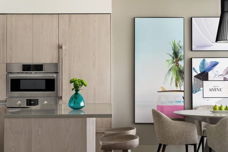 Gather for casual bites beside bright art and clean lines.
