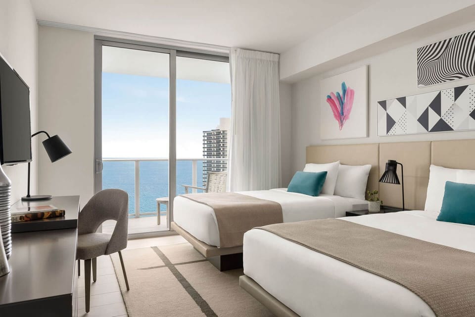 Wake up to ocean breezes in crisp, sunlit twin beds.