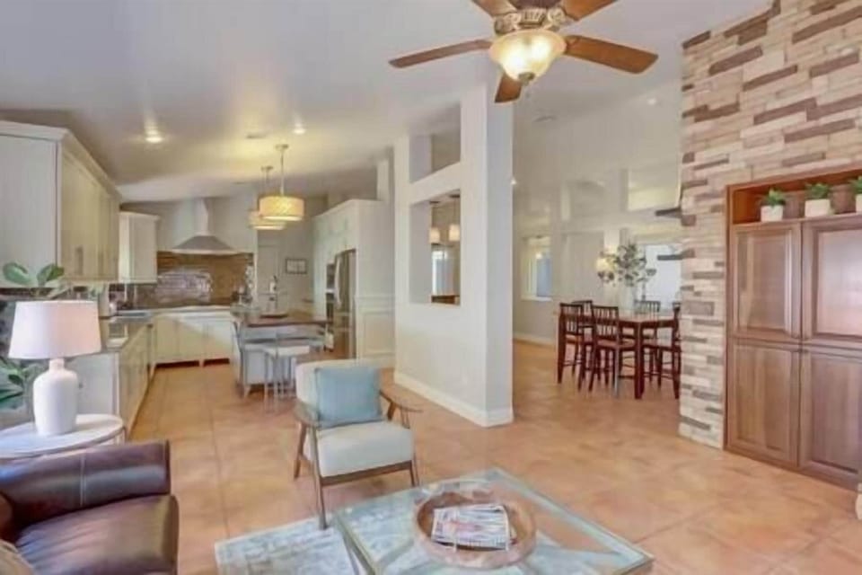 Living room that is open to kitchen and dining room.