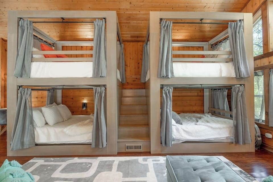 Your fun, custom-built bunk beds offer cozy sleeping spots.